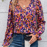 Blusa con estampado con cordon trasero de manga amplia