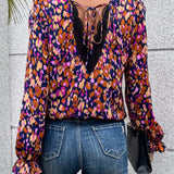 Blusa con estampado con cordon trasero de manga amplia