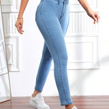 Jeans ajustados con bolsillo oblicuo