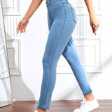 Jeans ajustados con bolsillo oblicuo