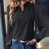 Blusa con estampado de lunares de cuello notch