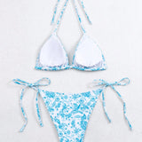 Swim Conjunto de bikini con estampado floral y nudo lateral