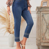 LUNE Jeans con bordado bajo crudo con inclinado bolsillos