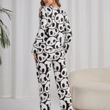 Conjunto de pijama pantalones con camiConjuntoa con estampado de panda