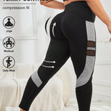 Yoga Futuristic Talla grande Leggings deportivos de color combinado de malla en contraste bolsillo de celular