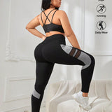 Yoga Futuristic Talla grande Leggings deportivos de color combinado de malla en contraste bolsillo de celular