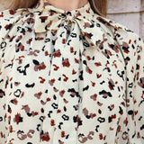 Blusa Con Estampado De Leopardo Y Mangas Abullonadas Con Corbata En El Cuello