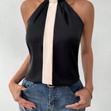 Blusa Con Cuello Halter Sin Mangas Y Bloques De Color