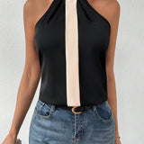 Blusa Con Cuello Halter Sin Mangas Y Bloques De Color