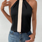 Blusa Con Cuello Halter Sin Mangas Y Bloques De Color