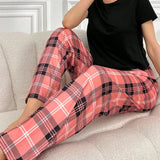 Conjunto De Pijama De Mujer Con Pantalones A Cuadros Y CamiConjuntoa De Manga Corta En Color Solido Con Cuello Redondo