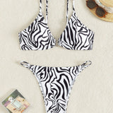 Swim Vcay Conjunto de bikini estampado de cebra para mujer con detalles circulares