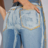 Haute Pantalones Jeans Acampanados Con Raya Metalica Y Cepillo