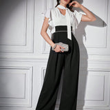 Modely Women's Color Block Jumpsuit With Ruffle Sleeves