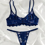 Conjunto de lenceria sexy azul bordado transparente con copa completa