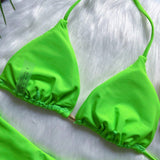 Conjunto de bikini verde de dos piezas con flecos y cuello halter