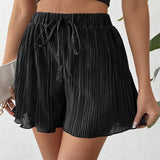 Prive Shorts elegantes y versatiles de verano para mujeres con pliegues de color puro, cintura elastica y piernas anchas en negro, ideales para salidas casuales y vacaciones