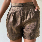Essnce Pantalones cortos de moda para mujeres con brillo dorado y bolsillos