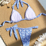 Conjunto de bikini de cuello halter con estampado floral de la serie de vacaciones de moda para mujeres