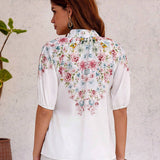 Camisa femenina con cuello alto estampado floral y botones en la parte delantera