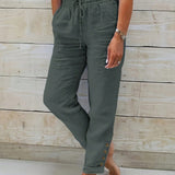 Pantalones conicos informales con cintura con cordon, boton decorativo, bolsillos inclinados y ajustados