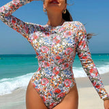 Swim SPRTY Traje de bano de una pieza de manga larga para mujer con estampado floral de moda para la playa de verano, impresion aleatoria