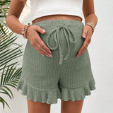 Pantalones elasticos de maternidad con borde de volantes, cintura con lazo, tira de pozo, simple y versatil