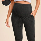 MaterniWear Shorts casuales de estilo callejero para mujeres embarazadas con bolsillos en color solido