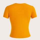 Slayr Camiseta ajustada amarilla con estampado abstracto de cara sonriente, estilo casual de calle para mujeres atractivas de festival de musica de verano 2024