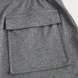 Slayr Pantalones largos informales de moda callejera para mujer con ajuste cenido, bolsillos traseros y aberturas en el dobladillo, color gris