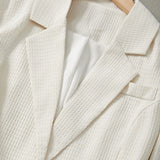 Clasi Conjunto de traje de un solo color con solapa, abotonadura simple y manga larga