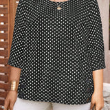 Camisa de lunares negros sobre fondo blanco para mujer de a grande, ideal para llevar diariamente en verano