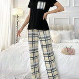 Conjunto de pijama de mujeres de moda con pantalones largos y mangas cortas a cuadros