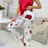 Conjunto de pijama para mujeres con tirantes cruzados y solido color de verano, camisola y pantalon largo con estampado de corazones