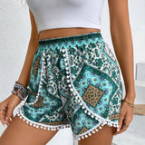 Frenchy Pantalones cortos de estilo playero con dobladillo irregular decorado con borlas