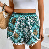 Frenchy Pantalones cortos de estilo playero con dobladillo irregular decorado con borlas