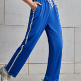 Pantalones deportivos de ocio atletico de ajuste recto con cintura de cordon contrastante, bolsillos diagonales laterales con costuras de parches en los laterales