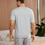Conjunto de pijama de mujer con camiConjuntoa de manga corta impresa minimalista de cuello redondo y pantalones cortos