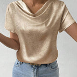 Blusa casual de cuello alto dorado con manga corta