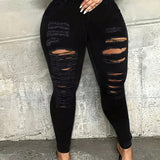 Pantalones Jeans de mujer de corte ajustado con diseno rasgado y bolsillos