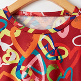 Coolane Camiseta casual de manga corta con cuello redondo y estampado de corazones para mujer en verano