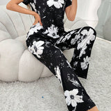 Conjunto de pijama blanco para mujeres con grandes estampados florales con camisa de manga corta y pantalones largos