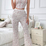 Conjunto de pijama de tirantes y pantalon largo con estampado floral pequeno para primavera y verano