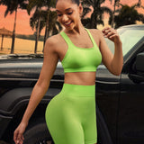 Sport Lifespree Conjunto deportivo de yoga para mujer con sosten deportivo y pantalones cortos con tiras cruzadas en la espalda y cuello redondo grande de un solo color