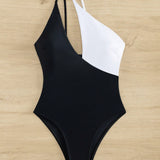 Nuevo traje de bano de una pieza en blanco y negro con diseno de recorte y estilo de hombro oblicuo para una apariencia sexy en las vacaciones en la playa (mujeres)