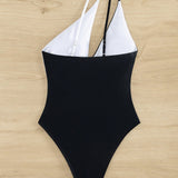 Nuevo traje de bano de una pieza en blanco y negro con diseno de recorte y estilo de hombro oblicuo para una apariencia sexy en las vacaciones en la playa (mujeres)