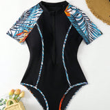 Swim SPRTY Traje de bano de una pieza delantero con cremallera y estampado tropical con bloques de color, ideal para la playa en el verano