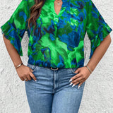 Camisa holgada para mujer de a grande de verano con estampado floral, cuello con muesca y mangas acampanadas para vacaciones