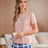 Conjunto de pijama para mujeres con camiConjuntoa de manga corta y shorts con estampado de moda