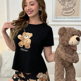 Conjunto de pijama informal para mujeres con camiConjuntoa de manga corta con estampado de osito de peluche y pantalon corto con cuello redondo